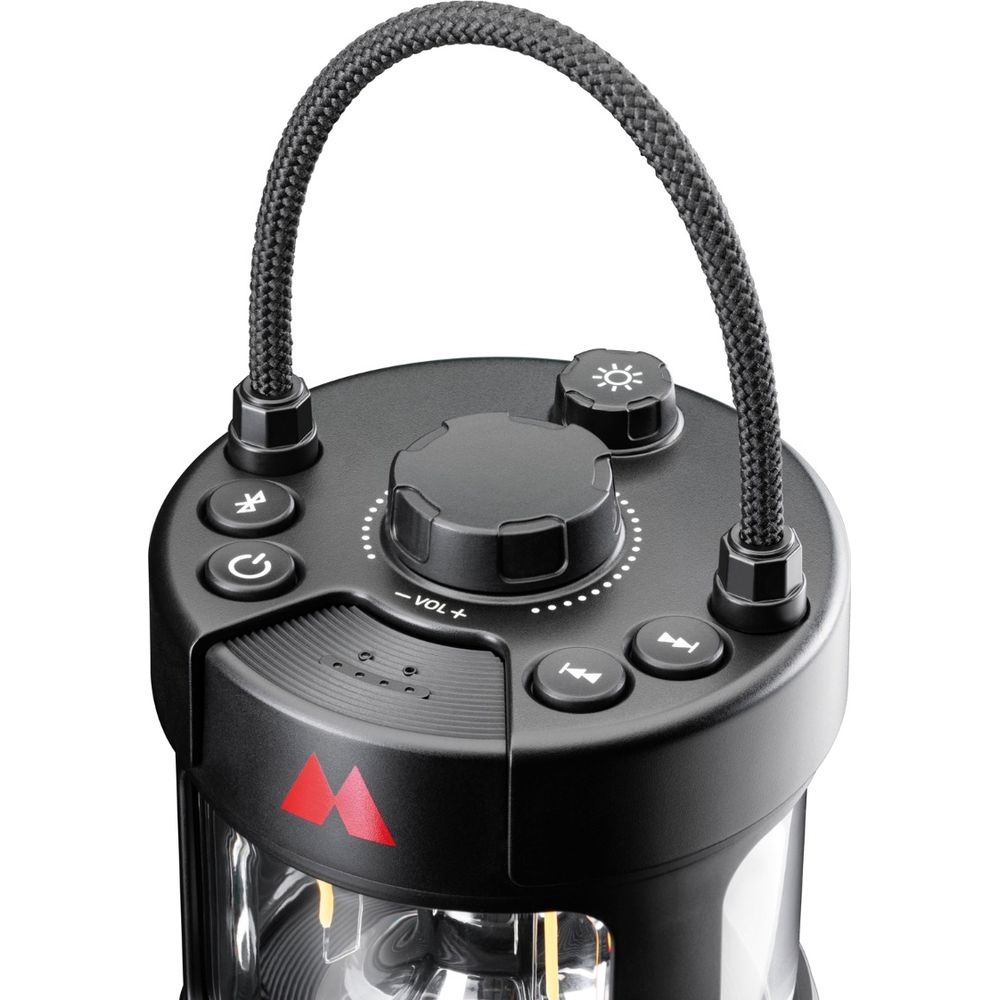 Haut-parleur noir avec poignée, bouton de volume et boutons.