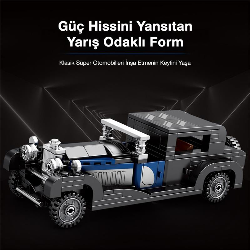Koyu arka plan üzerinde gümüş vurgulu, siyah ve mavi klasik araba maketi.