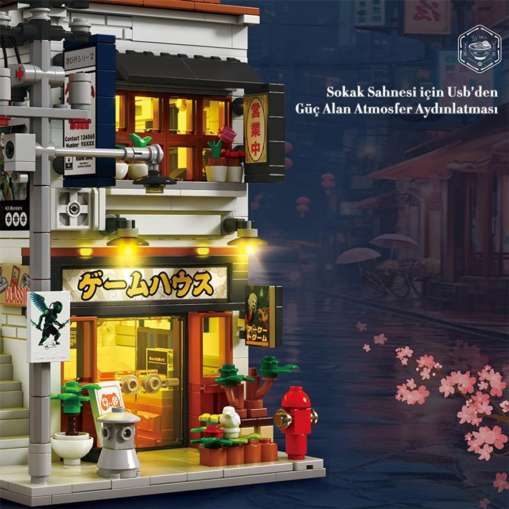 Yağmurda neon ışıklı ve kiraz çiçekli Japon binasının detaylı Lego modeli.