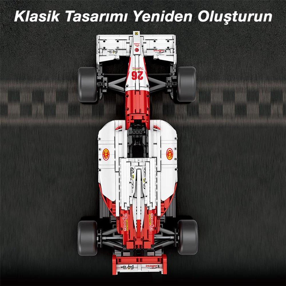 Kırmızı ve beyaz Lego Formula 1 aracı bir yarış pistinde.