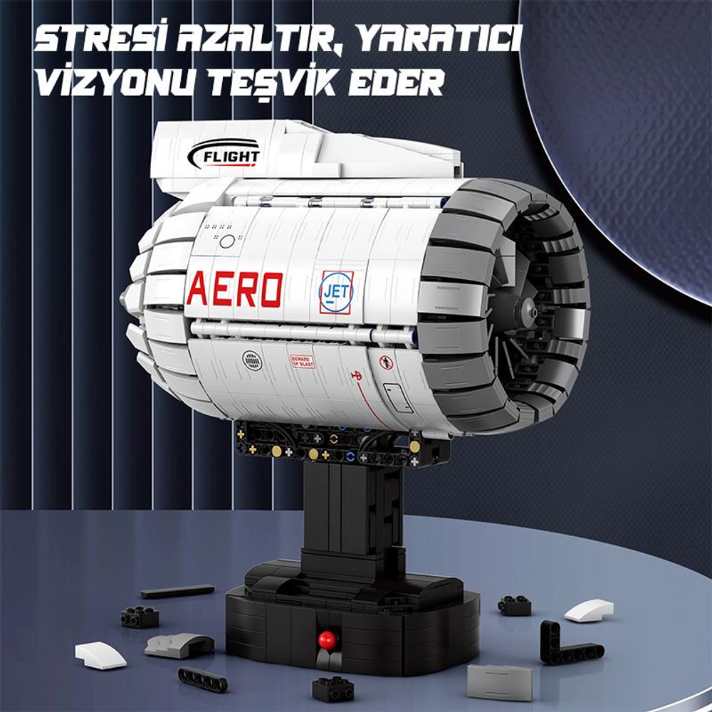 Yazılı ve logolu beyaz ve gri tuğla yapım jet motoru modeli.