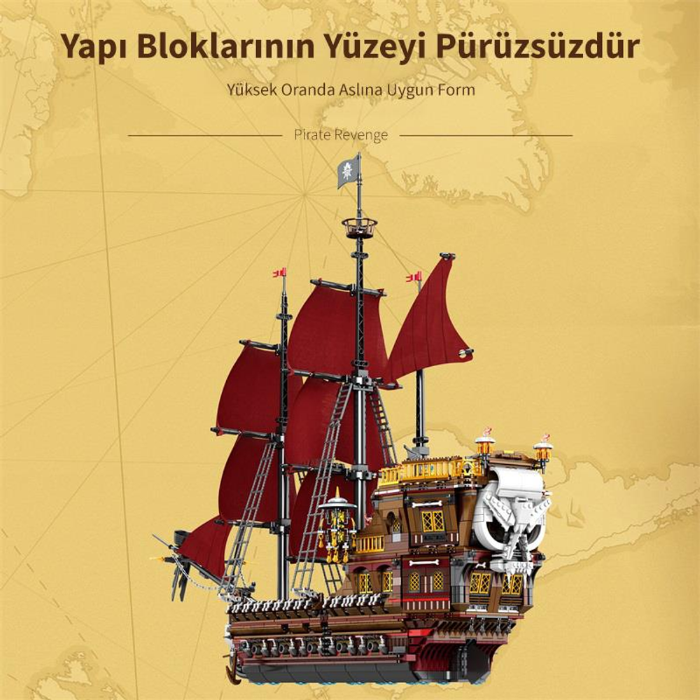 Kırmızı yelkenli ve başta kurukafası olan detaylı bir model gemi.