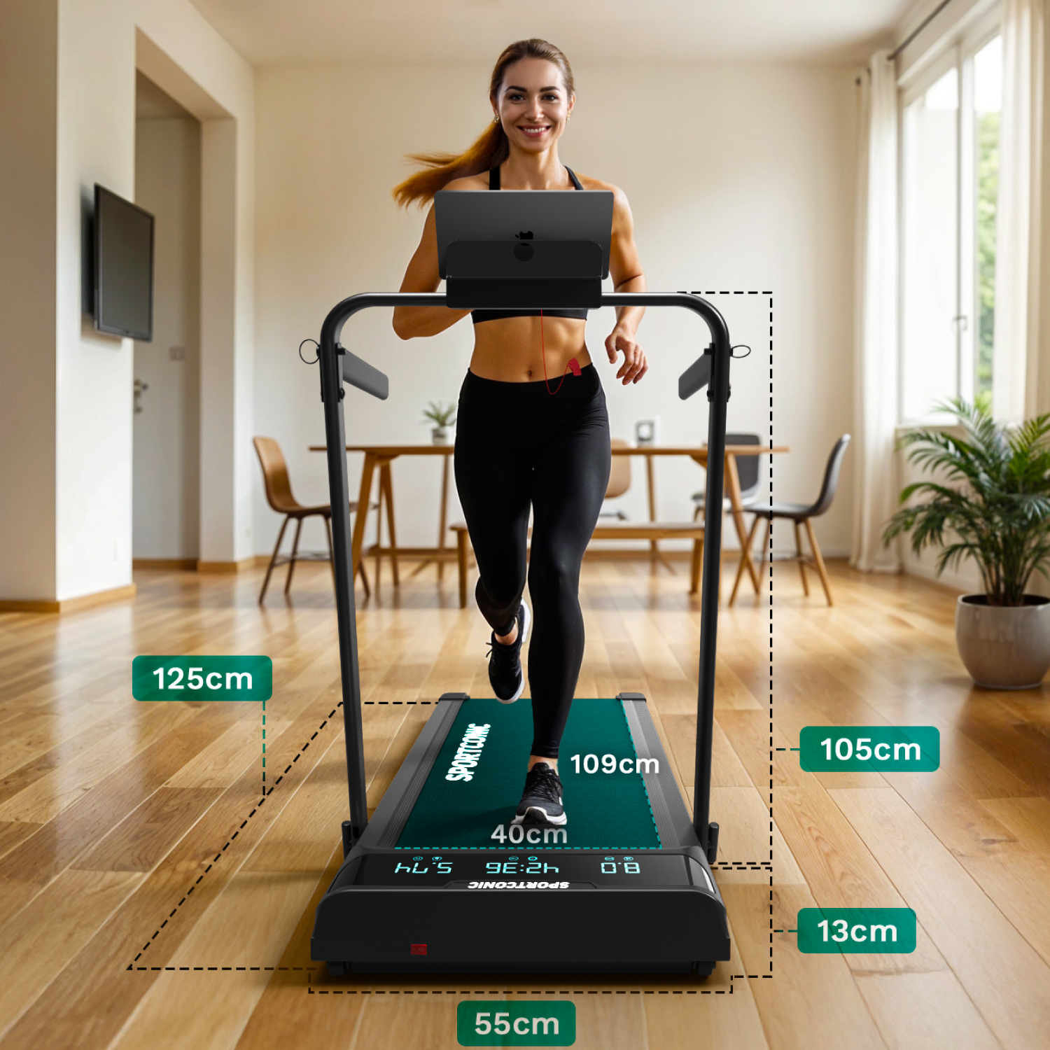 Een vrouw rent op een loopband met een laptop, met afmetingen aangegeven.