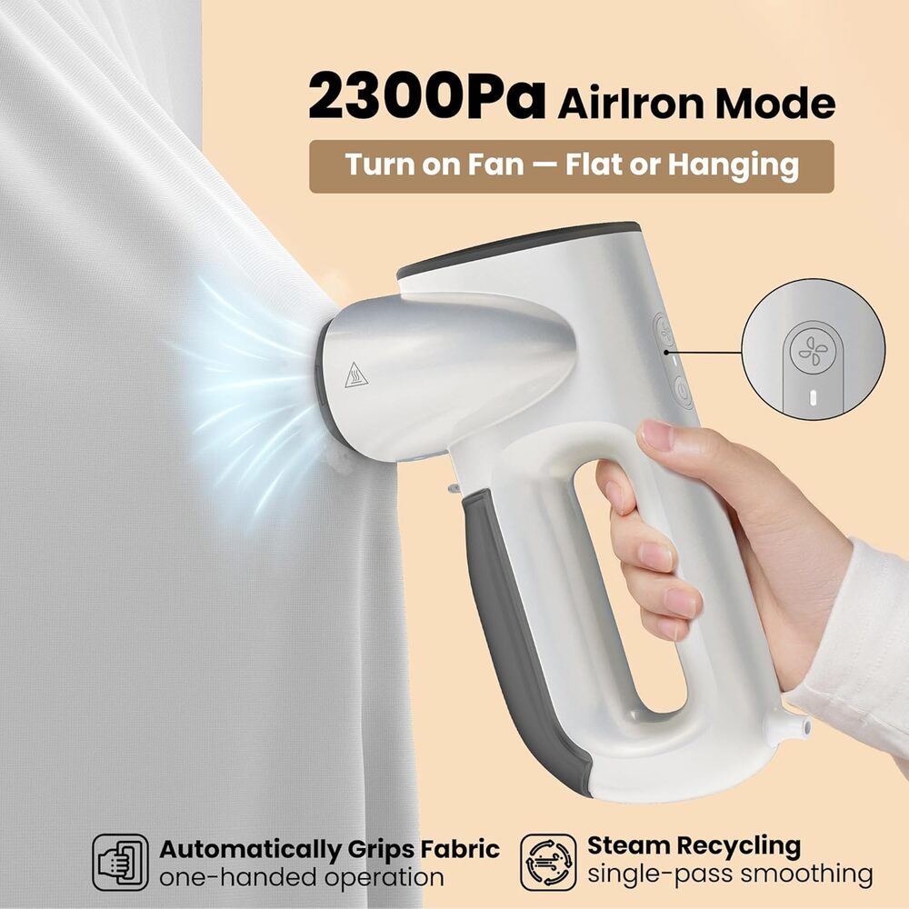 Un vaporizzatore per tessuti bianco con funzione aria diretto su tessuto bianco.