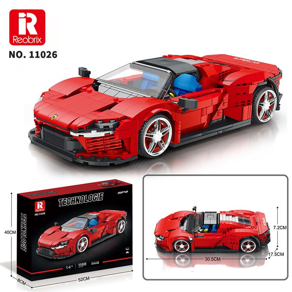 Kırmızı Lego spor araba beyaz jantlı ve mavi koltuklu. Yanında kutusu var.