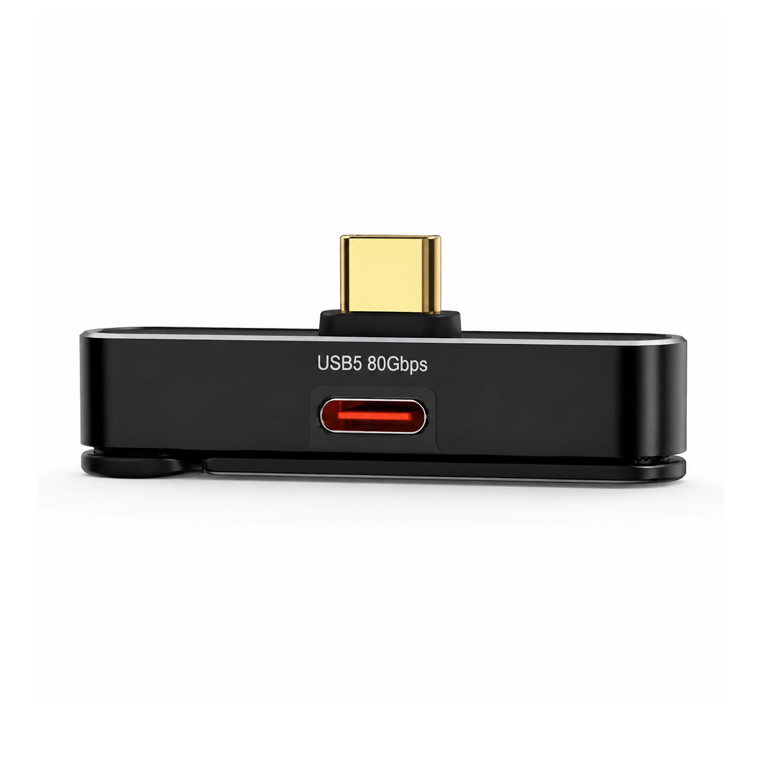 Schwarzer USB-C-Adapter mit goldenem Stecker und rotem Ladeanschluss.