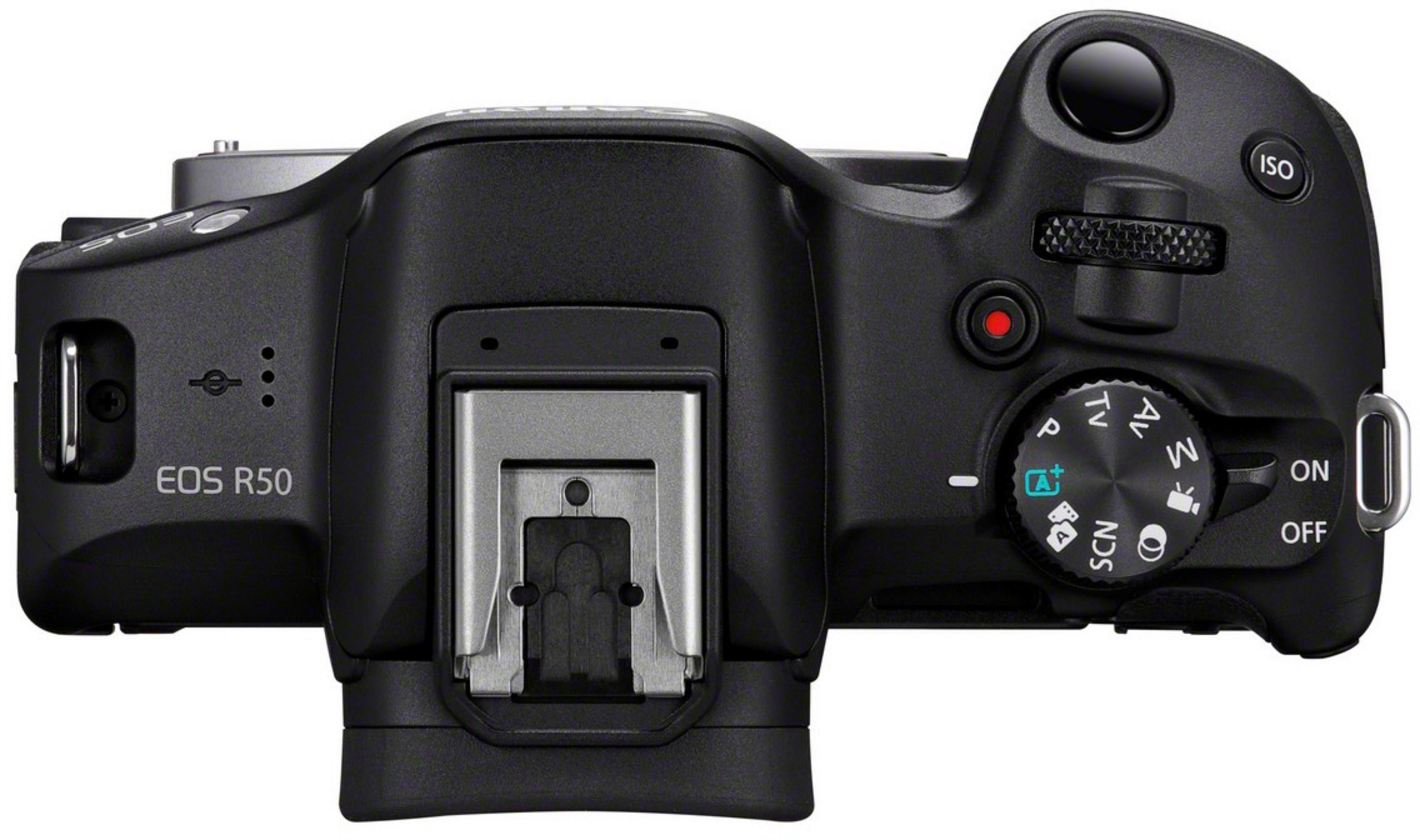 Draufsicht auf eine schwarze Canon EOS R50 Kamera mit Fokus auf das obere Gehäuse und die Bedienelemente.