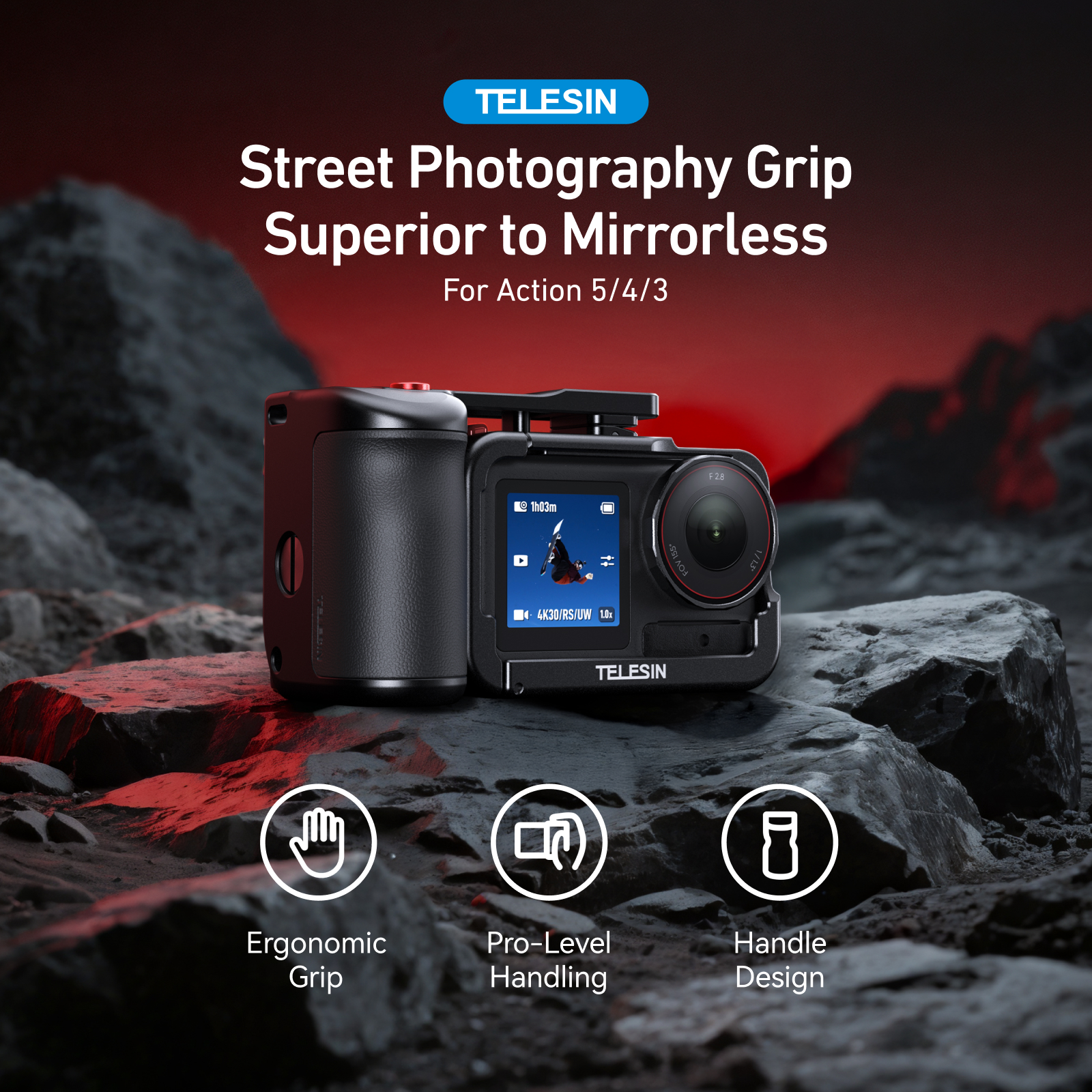 Een zwarte TELESIN actiecamera grip met scherm, rustend op rotsen.