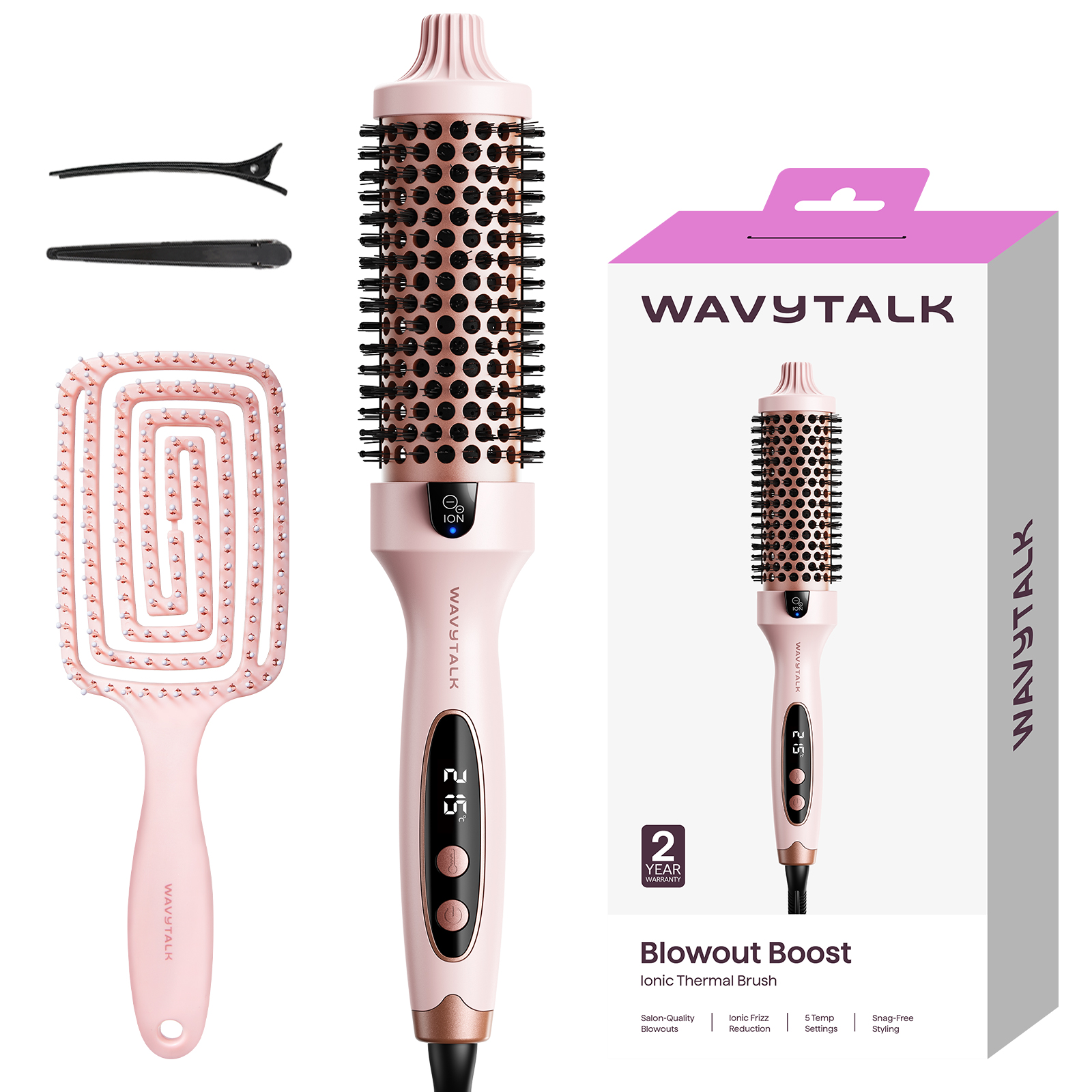 Une brosse thermique ionique rose avec accessoires et emballage.