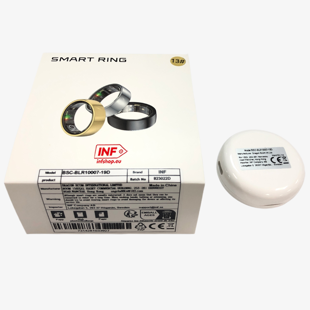 Smart Ring Verpackung mit drei Ringen (Gold, Silber, Schwarz) und weißem Ladecase.