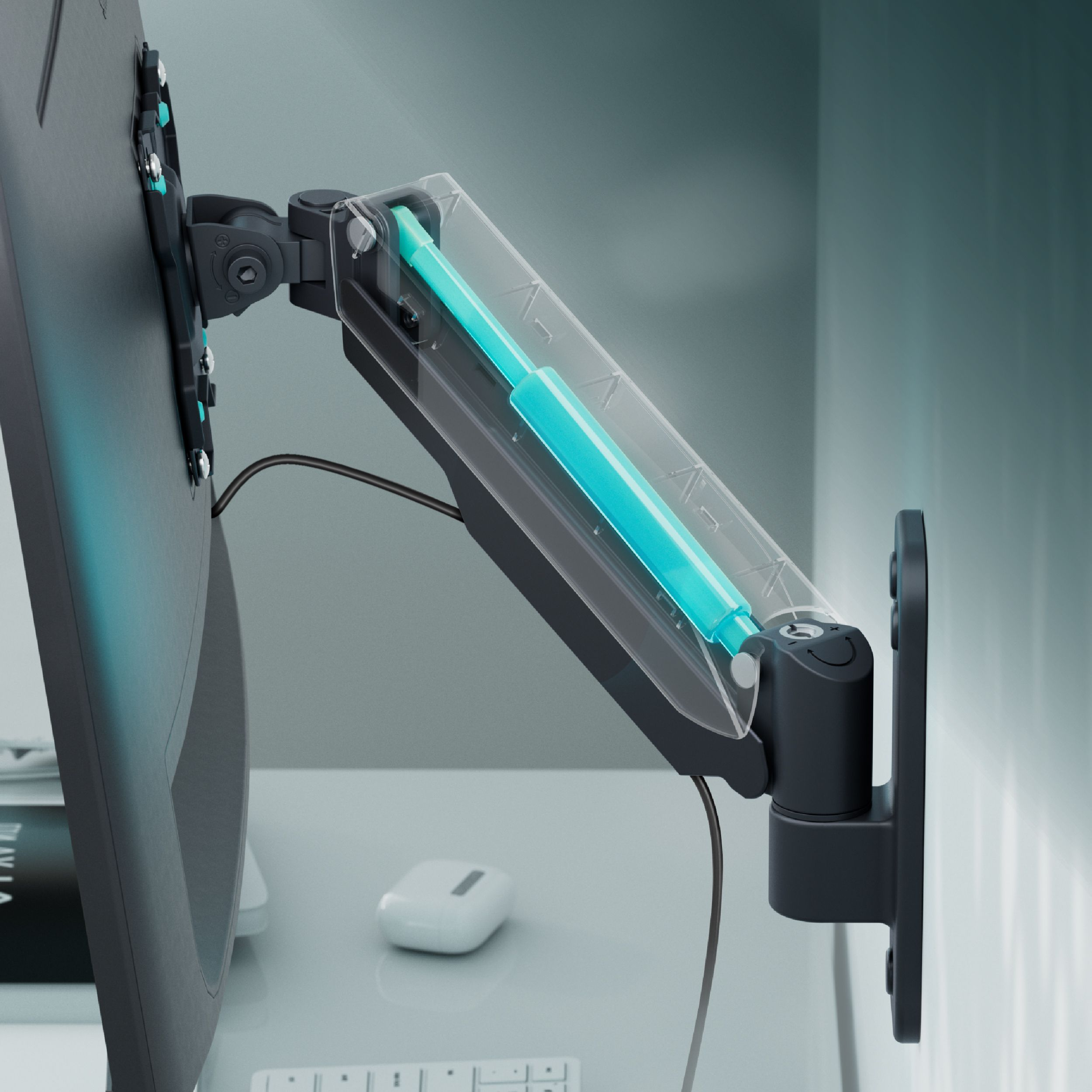 Ein Monitorarm aus schwarzem Metall mit blauem Zylinder, an einer Wand befestigt.
