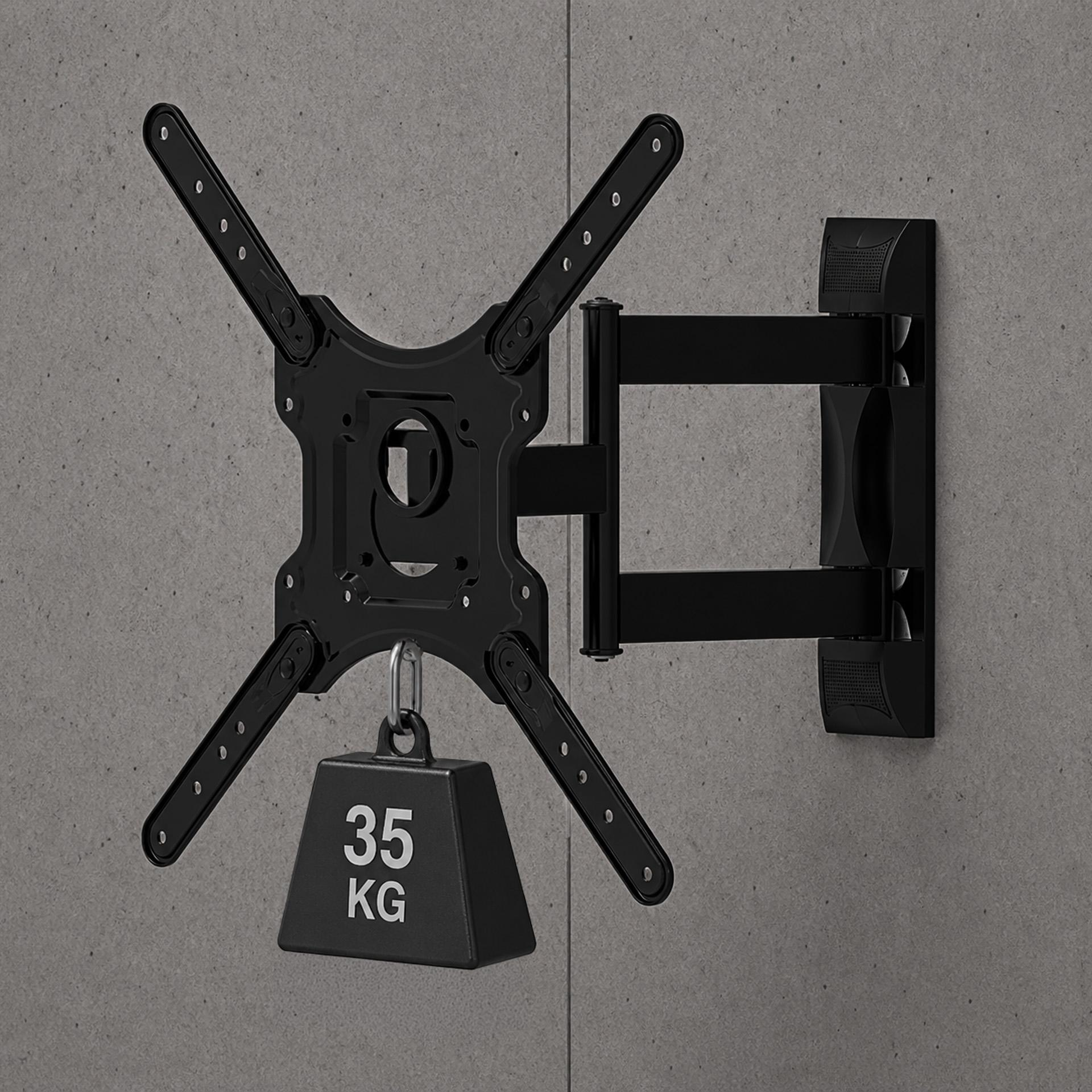 Supporto TV da parete nero con test di peso da 35 kg su muro in cemento.