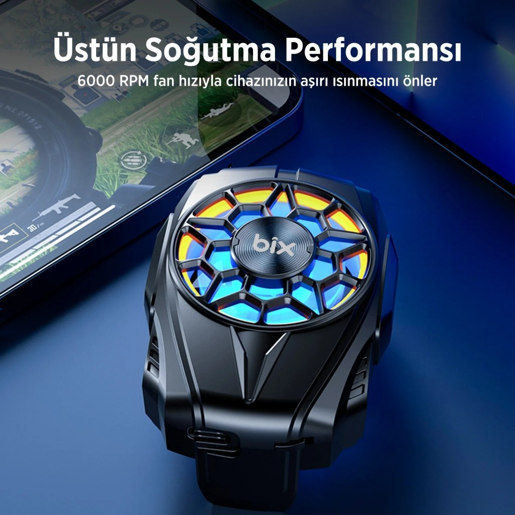 Bix logolu, mavi/sarı ışıklı siyah telefon soğutucu, telefonun yanında.