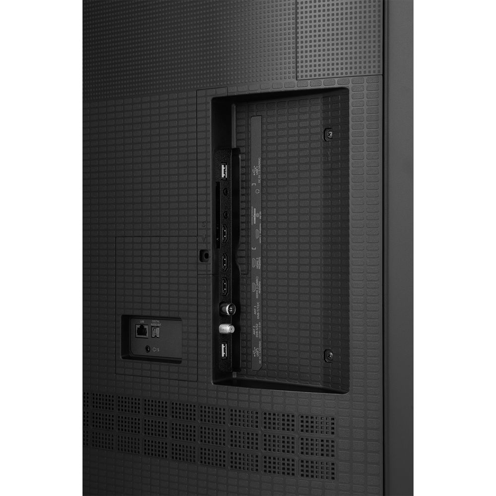 Tył telewizora pokazujący porty: USB, HDMI, LAN, wejście antenowe i wyjście audio.