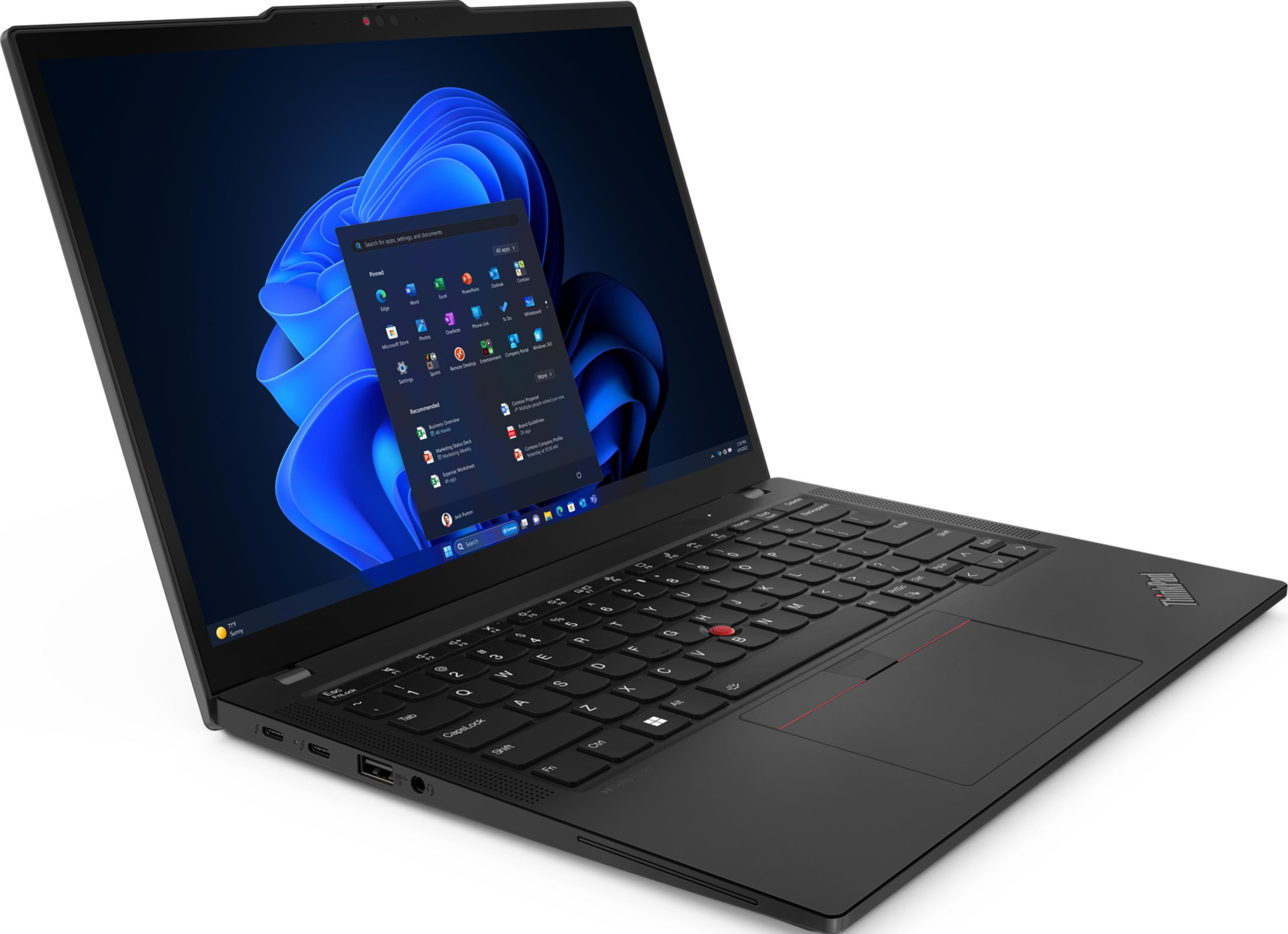 Un laptop Lenovo nero che mostra Windows 11 con app aperte. Tastiera e trackpad visibili.