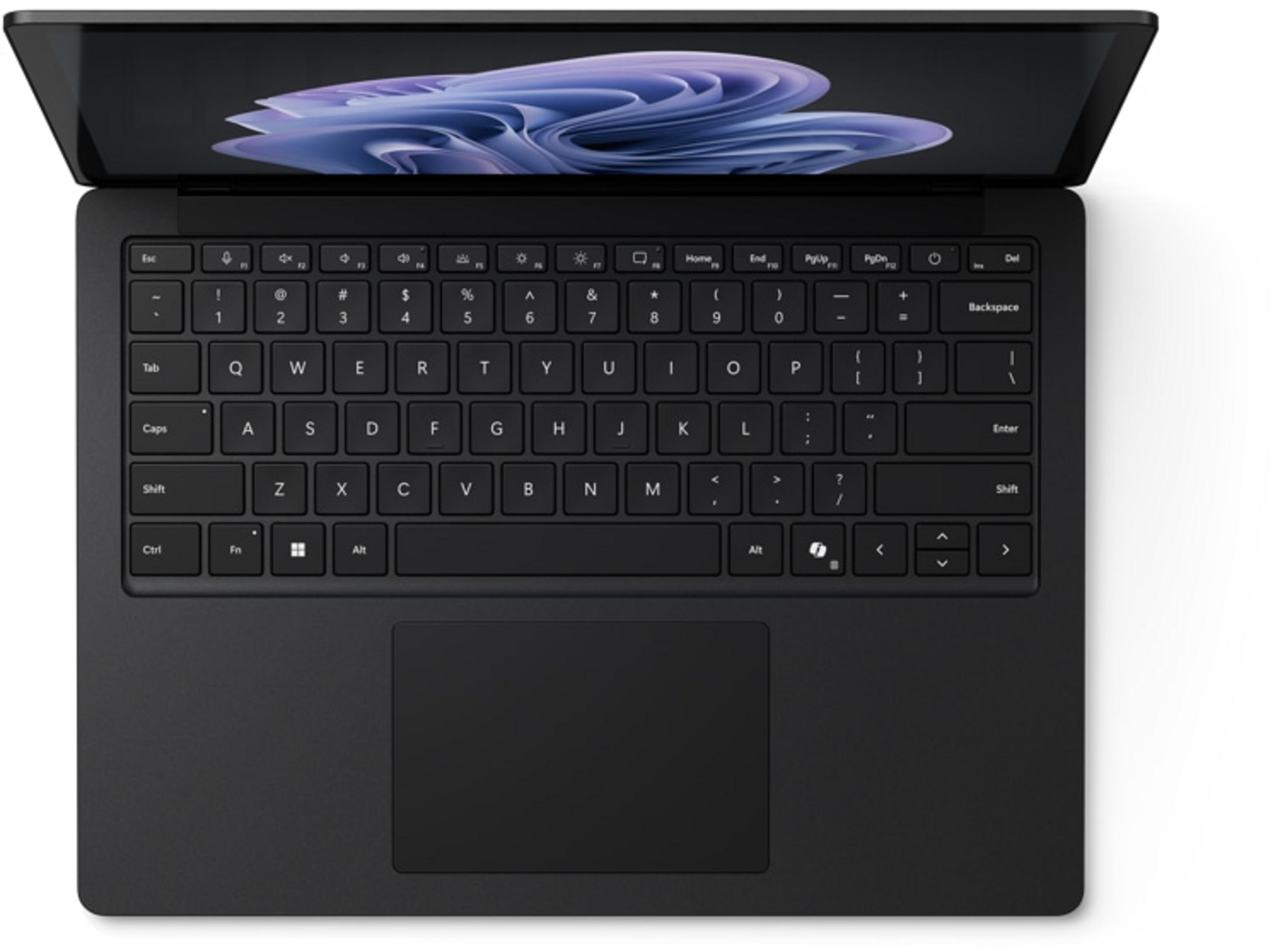 Ein schwarzes Notebook mit geöffnetem Bildschirm, das einen blauen Hintergrund zeigt.