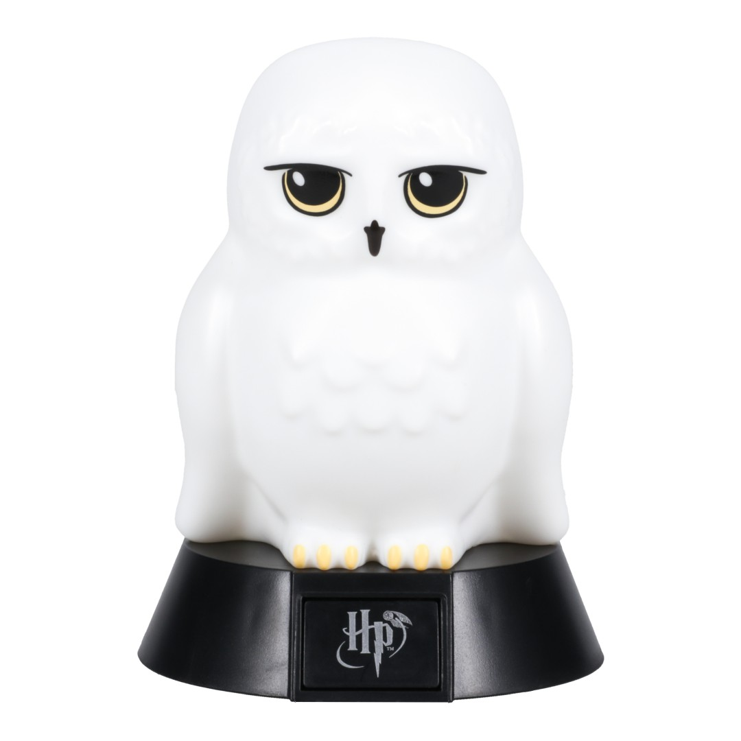 Biała lampka nocna sowa na czarnej podstawie z logo HP.
