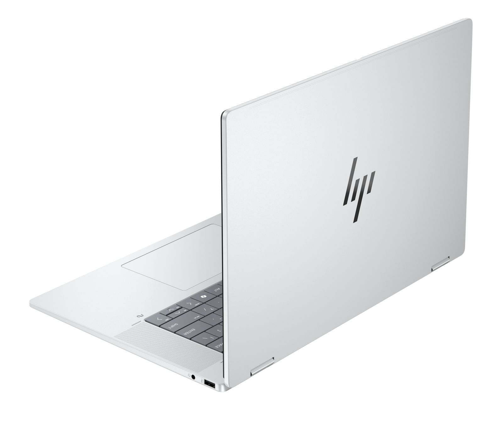 Srebrny laptop z logo HP na pokrywie, widoczna klawiatura i gładzik.