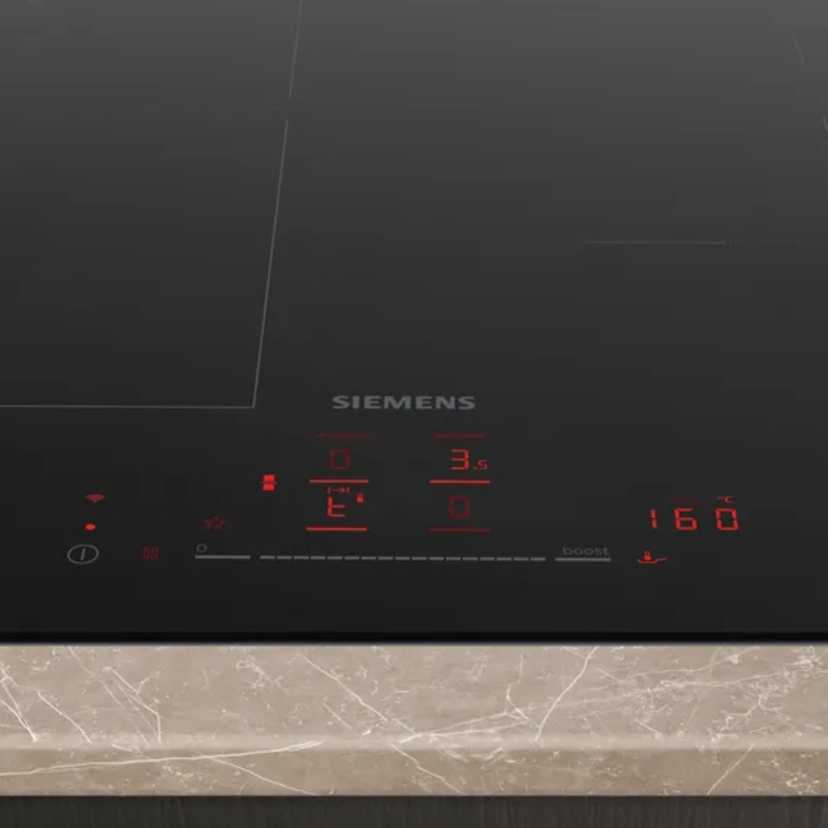 Siemens inductiekookplaat met rood digitaal display voor vermogen en temperatuur.