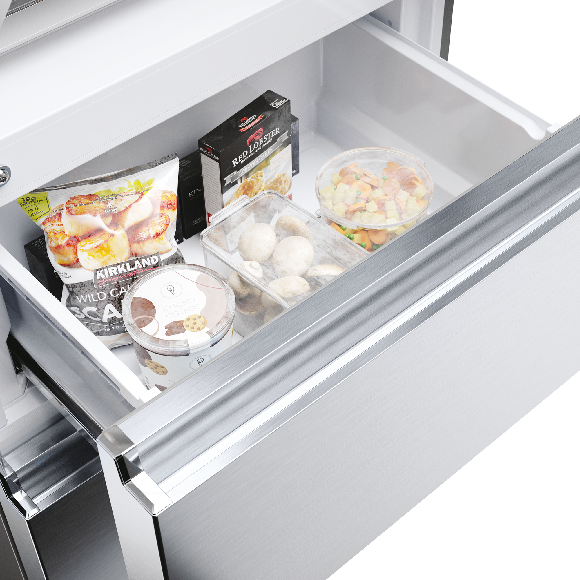 Cajón abierto del refrigerador con vieiras congeladas, pasteles de langosta, champiñones y mezcla de verduras.