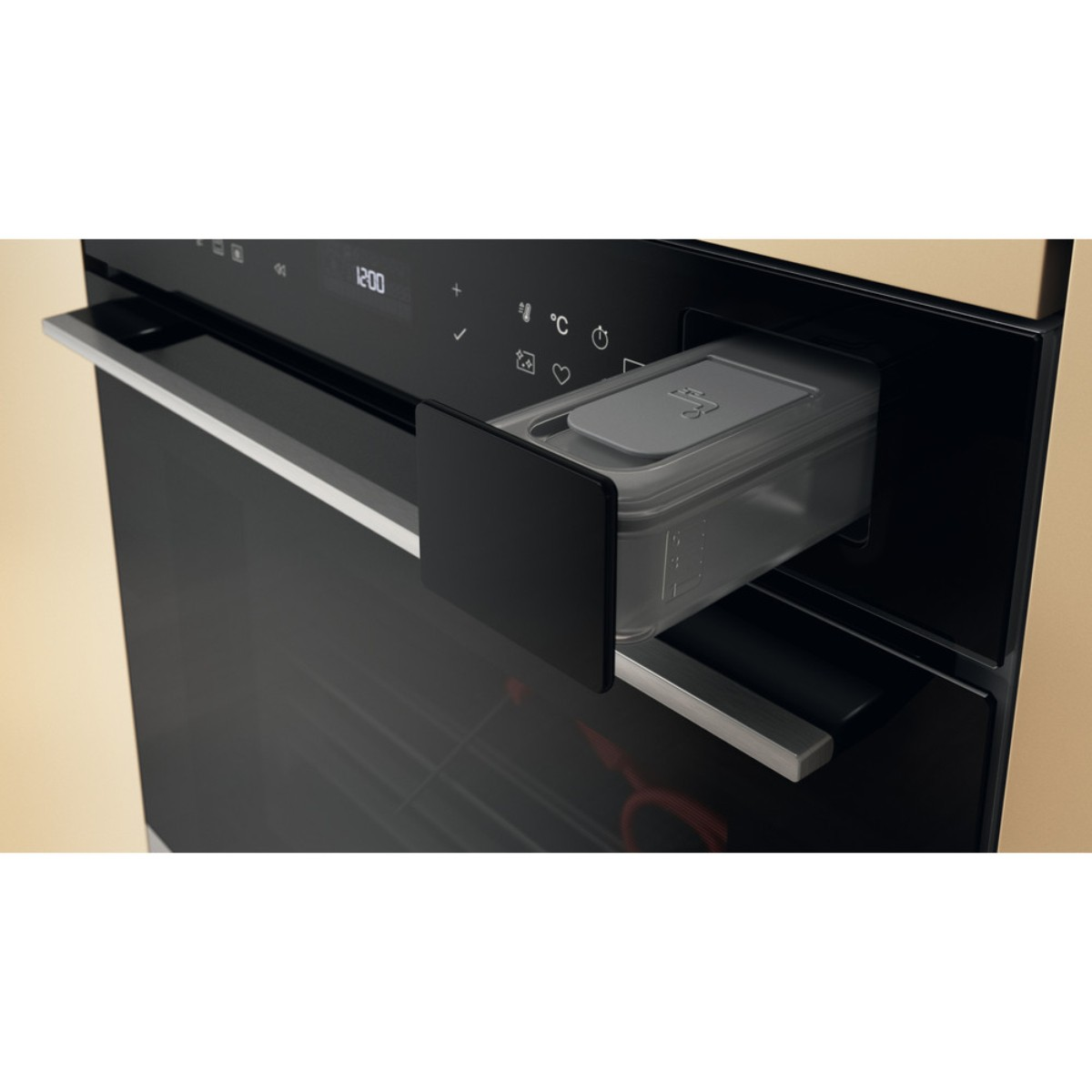 A modern oven with a drawer pulled out containing a tray.