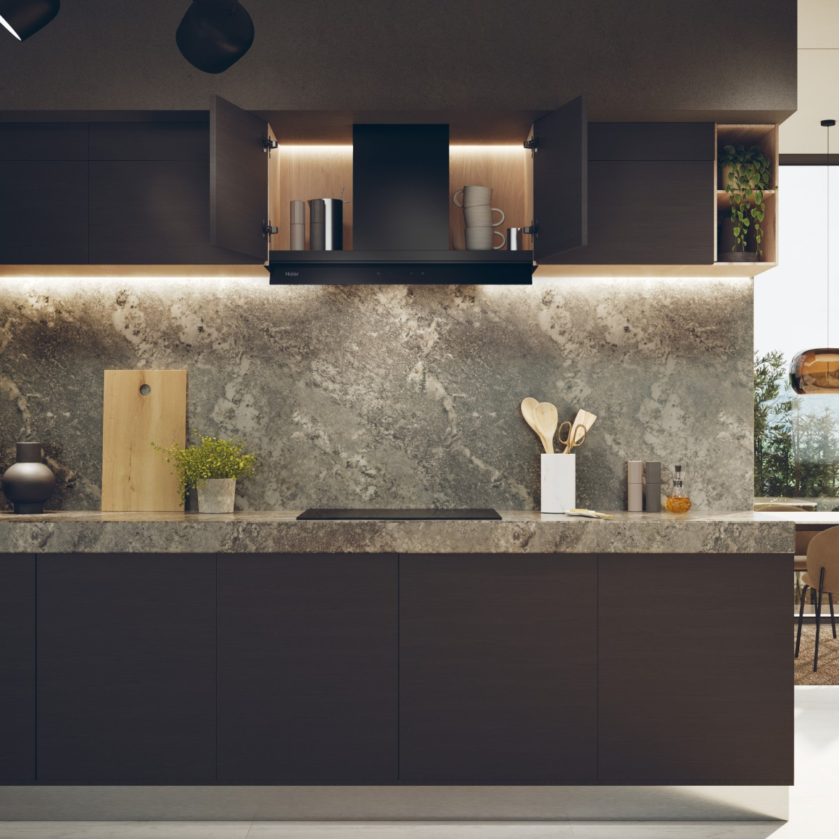Una cocina moderna de madera oscura con encimeras de piedra, campana negra y plantas.