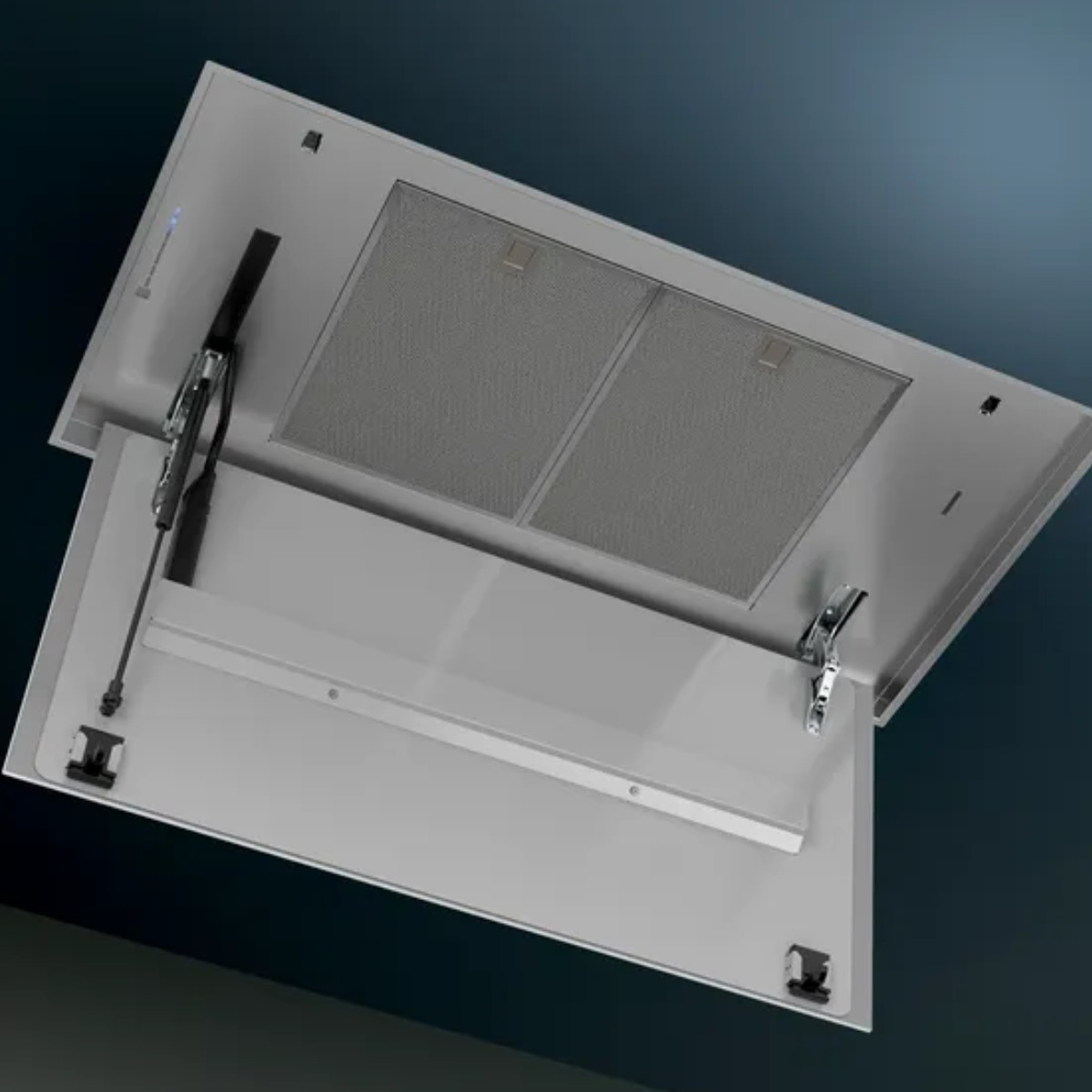 Een zilverkleurige afzuigkap met open klep, met zichtbare filters.
