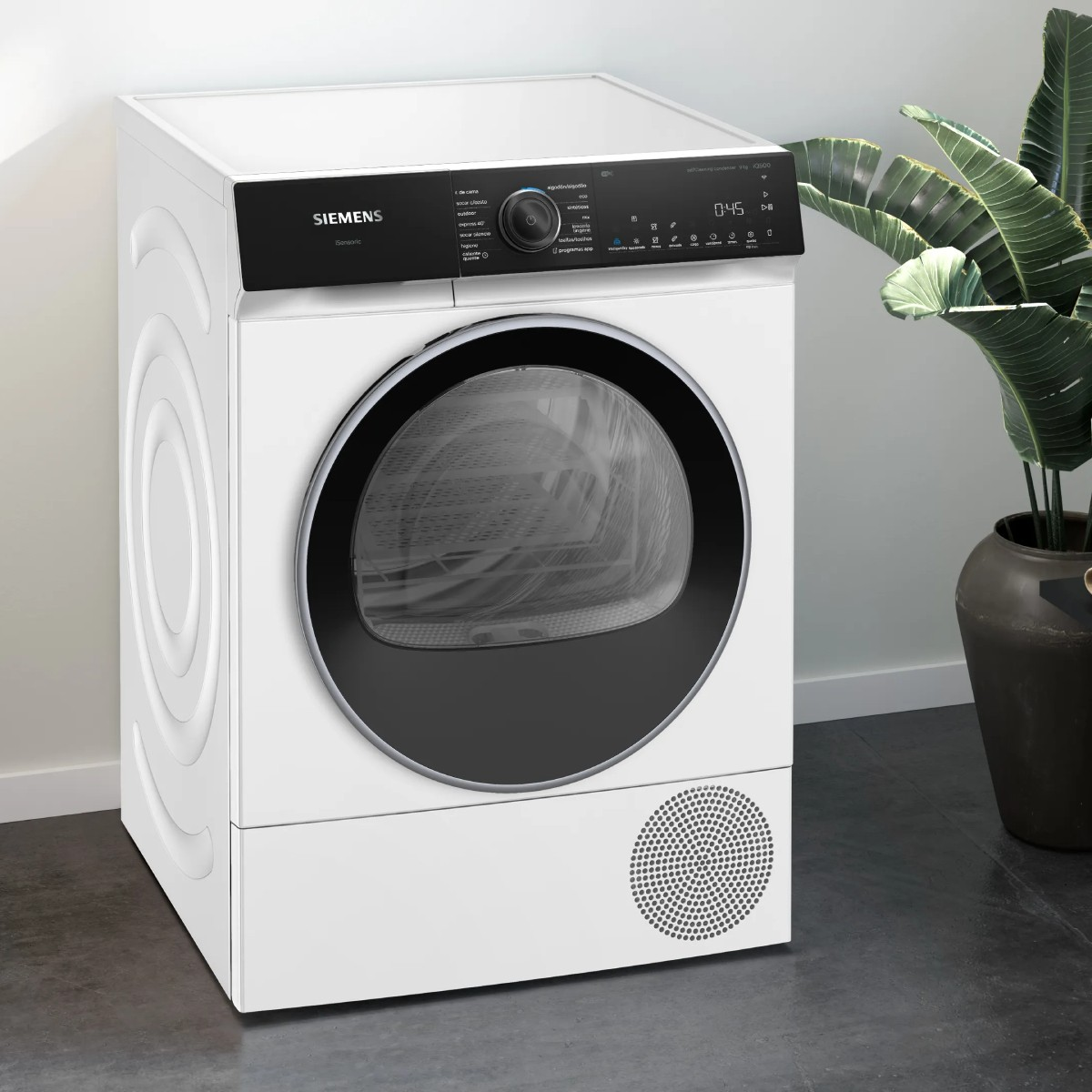 Ein weißer Siemens Wäschetrockner mit schwarzer Tür und Bedienfeld.