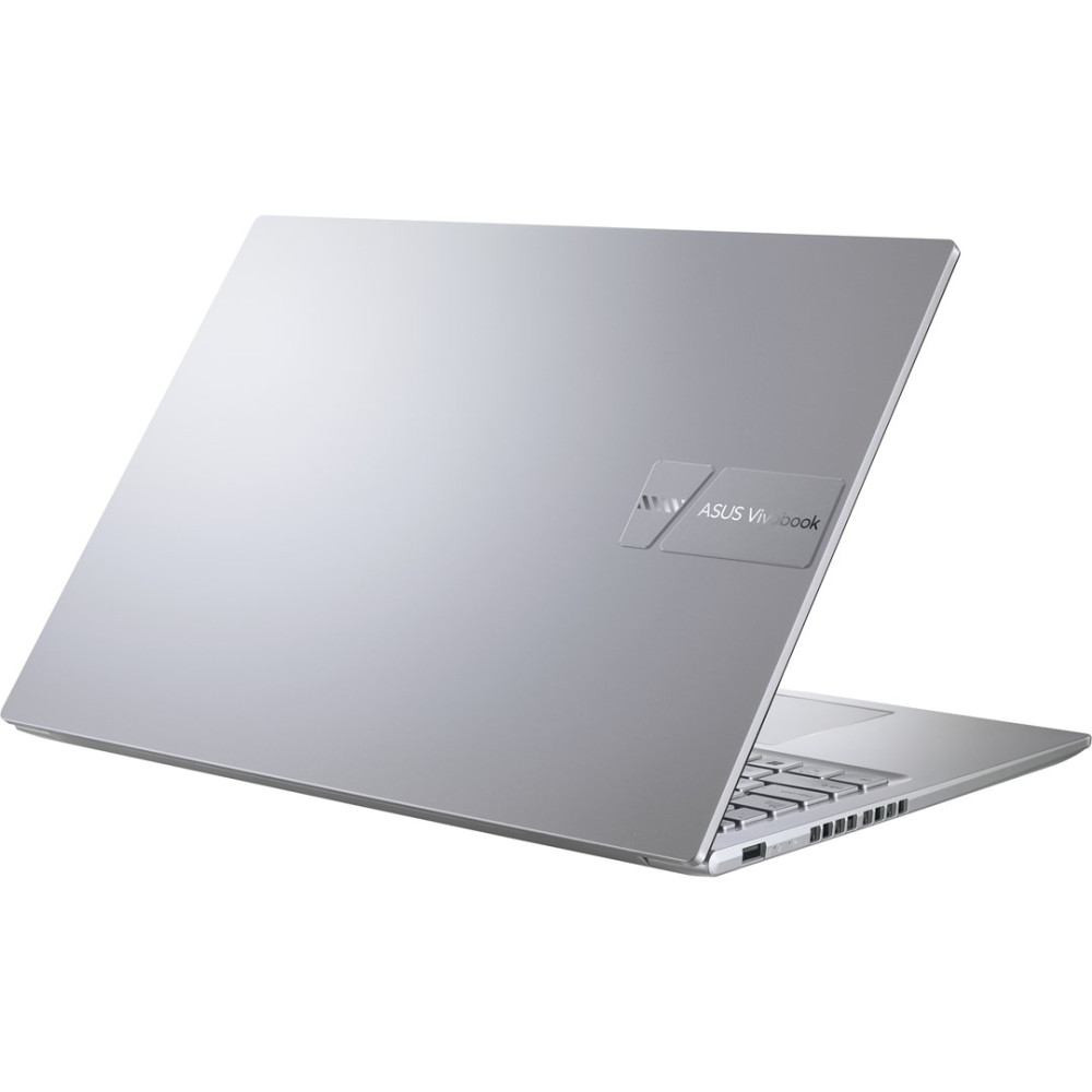 Srebrny laptop ASUS Vivobook, pokazany od tyłu, z widoczną klawiaturą i logo.
