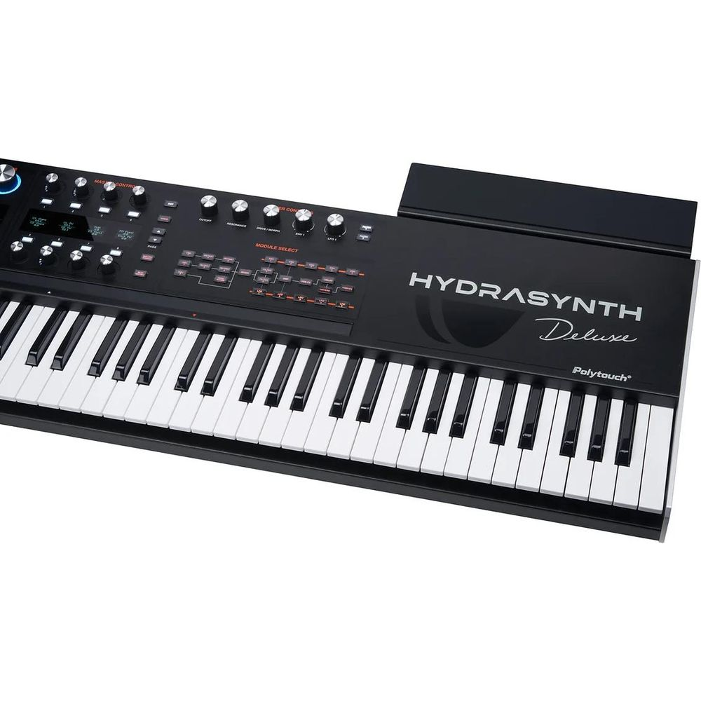 Un clavier de synthétiseur noir avec des touches blanches et noires. Étiqueté HYDRASYNTH Deluxe.