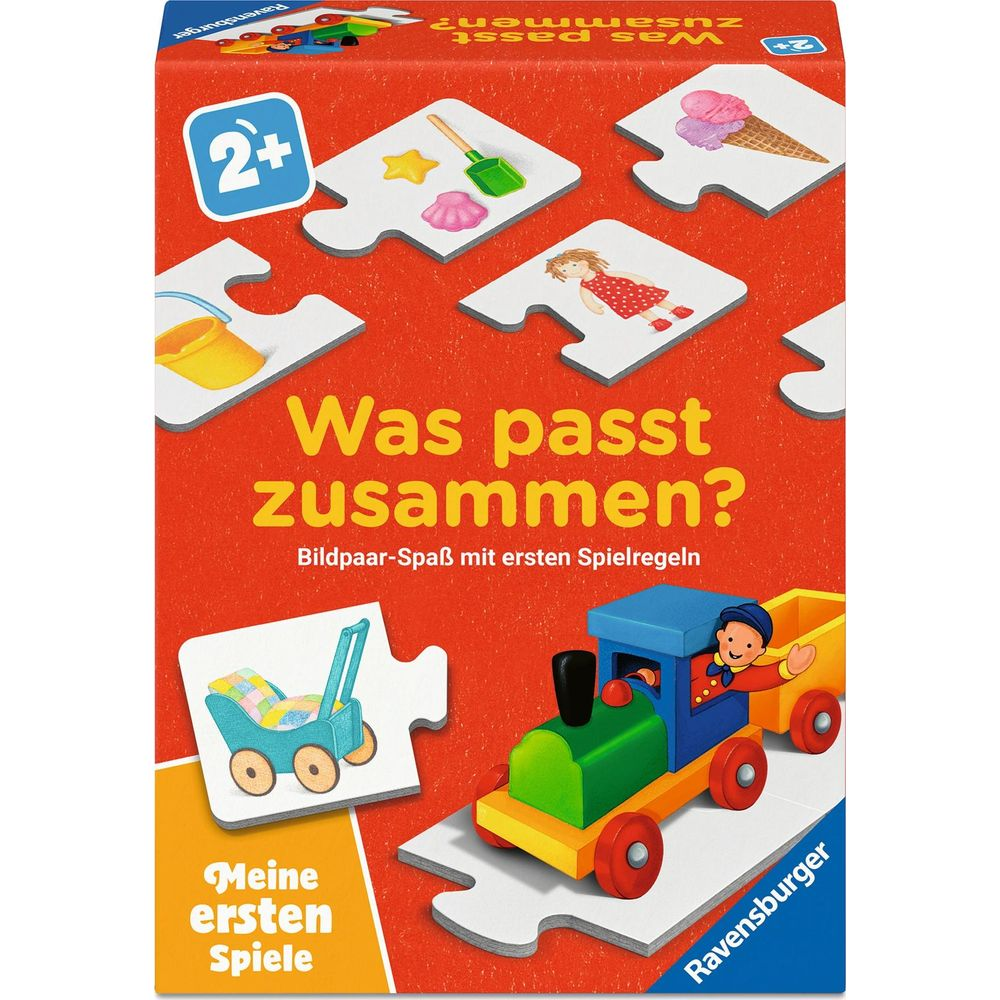 Scatola gioco Ravensburger con pezzi puzzle: treno, gelato, secchio, bambina.