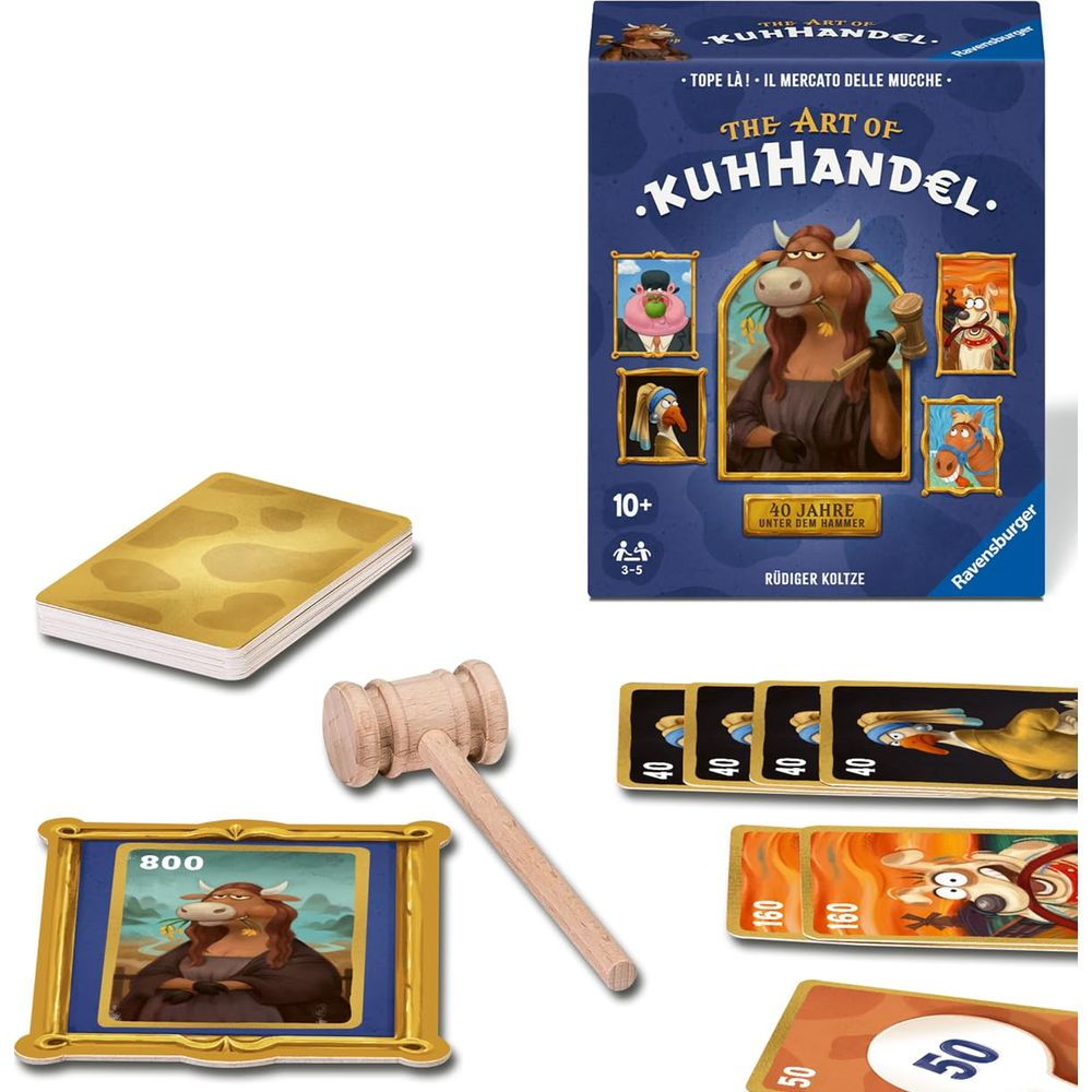 Spielbox 'The Art of Kuhhandel' mit Spielkomponenten wie Karten, Hammer und Bilderrahmen.