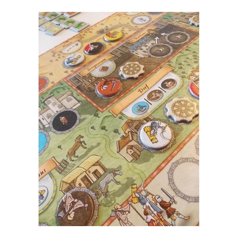 Gioco da tavolo con villaggio medievale, edifici, cavalli e segnalini.