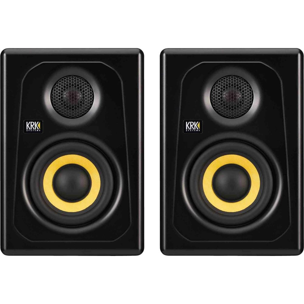Due monitor da studio KRK neri con anelli gialli sui coni.