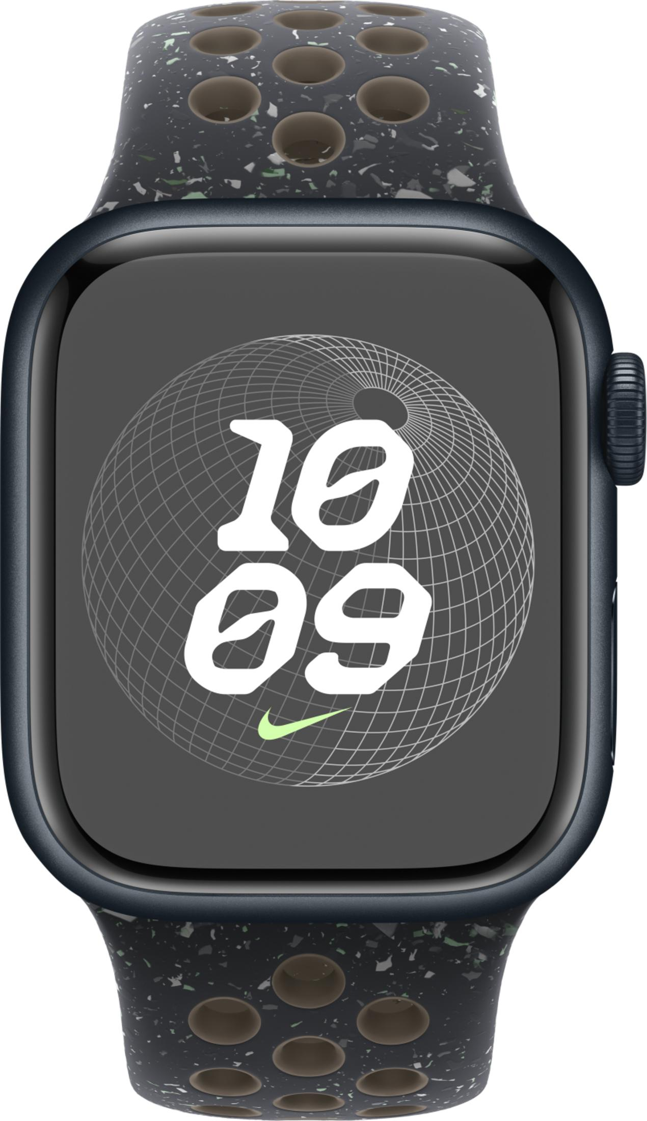 A dark gray smartwatch with a speckled band and a dark display showing time.