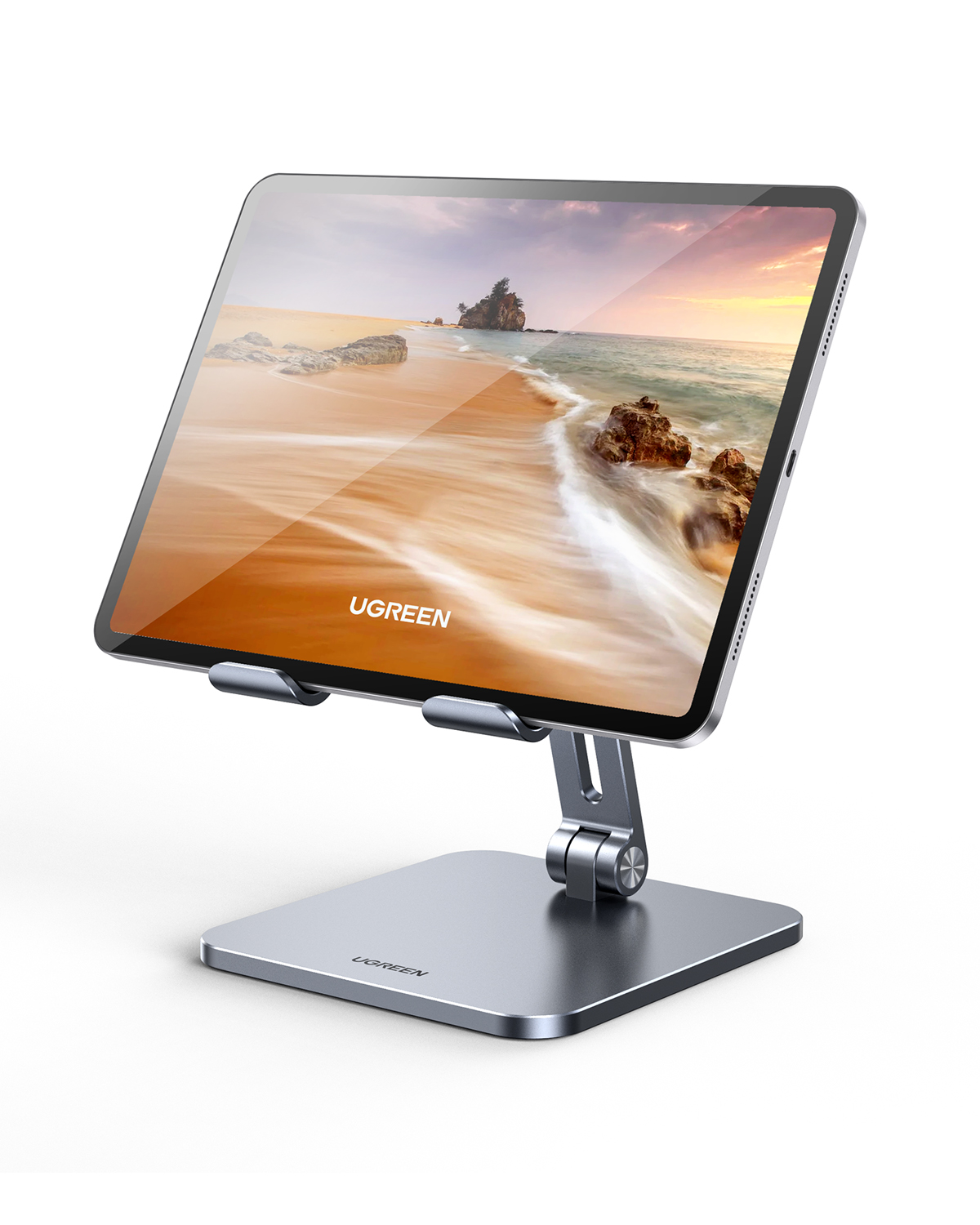 Supporto per tablet grigio con braccio regolabile, che mostra un tablet con scena di spiaggia.