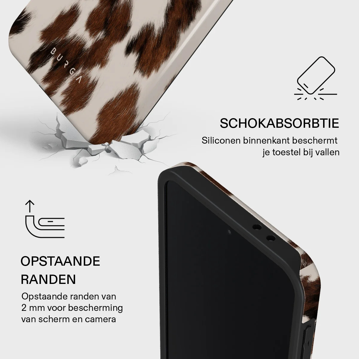 Coque de téléphone imprimé peau de vache tombant sur surface blanche fissurée