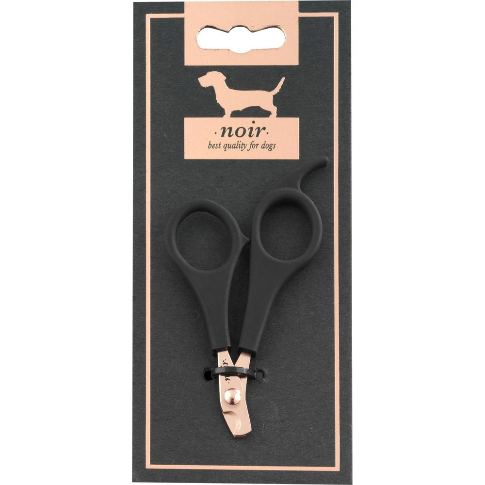 Schwarze Hundeschere auf schwarzem Karton mit silbernem Hundesilhouette-Logo.
