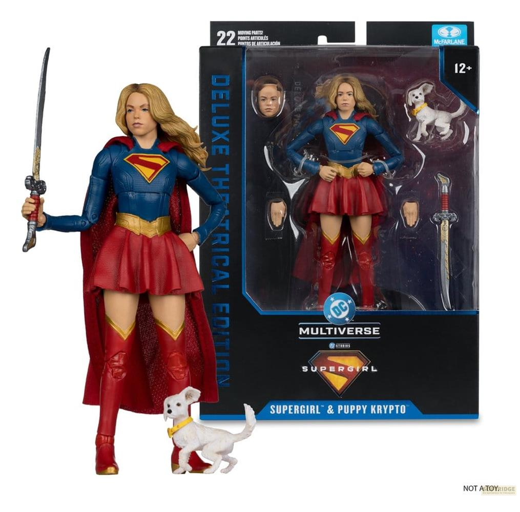 Supergirl-Actionfigur mit Krypto, im Karton und daneben.