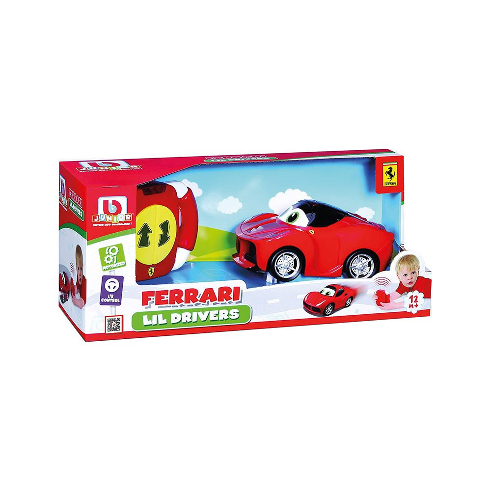 Une voiture jouet Ferrari rouge avec télécommande et emballage.