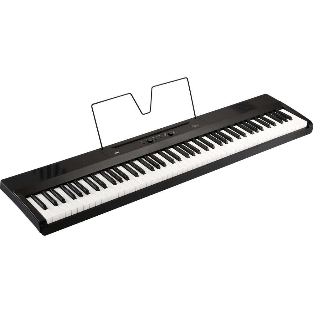 Ein schwarzes Keyboard mit weißen und schwarzen Tasten, Notenpult und Bedienelementen.