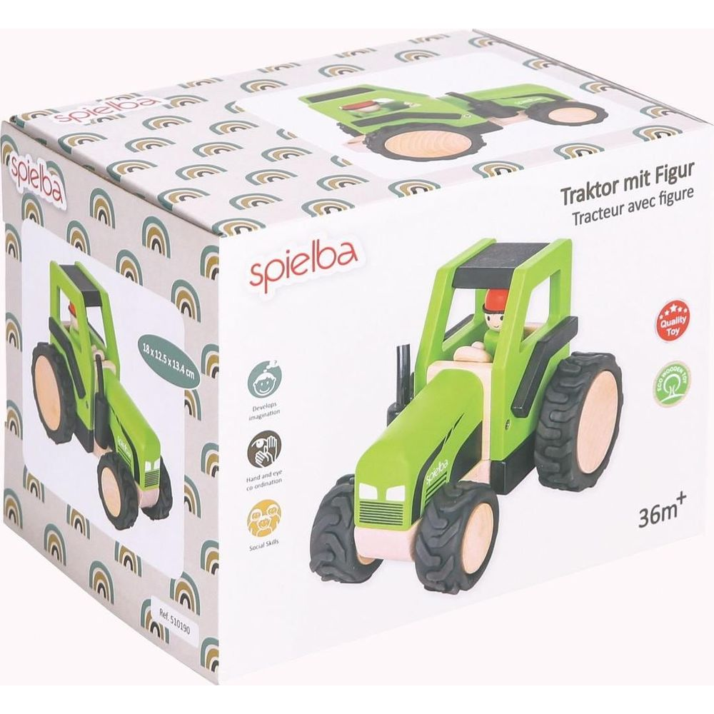 Boîte pour un tracteur jouet en bois vert avec figurine, motifs arc-en-ciel.