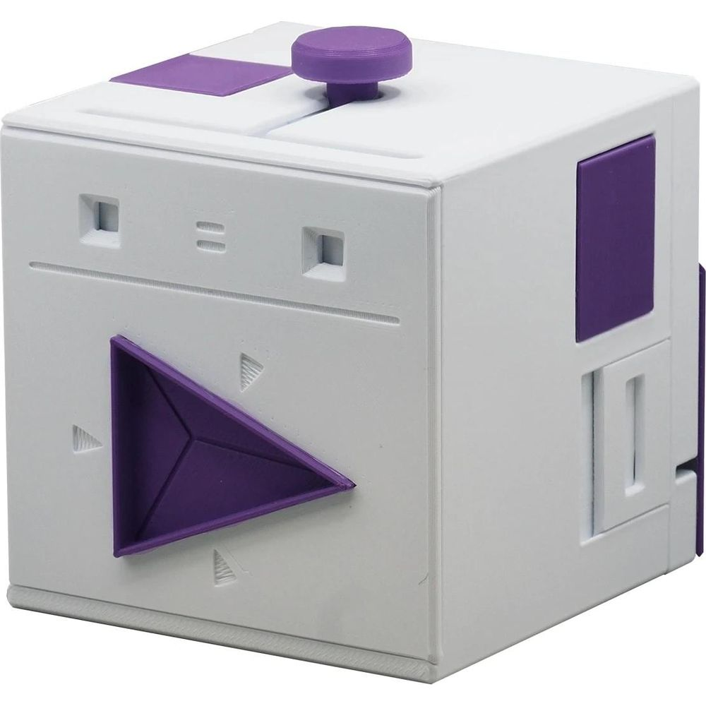 Un cubo bianco con accenti viola, una manopola in cima e triangoli sul lato.