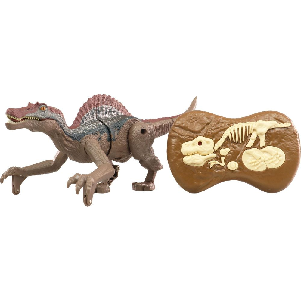 Ein brauner Spielzeug-Dinosaurier mit Rückensegel, daneben eine braune Fernbedienung mit Knochenabbildungen.