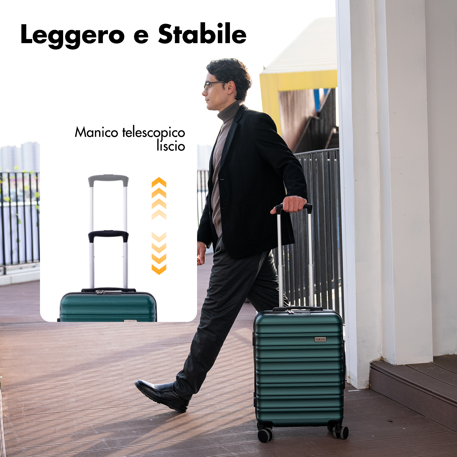 Uomo in giacca nera tira trolley verde su percorso in legno.