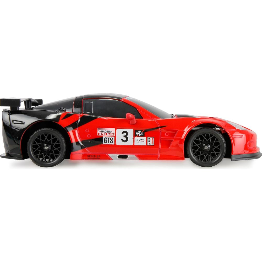 Un coche de juguete rojo y negro teledirigido con el número 3.
