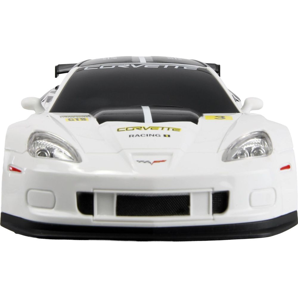 Ein weißes Corvette-Rennauto mit schwarzen Streifen und "Corvette Racing" Aufschrift.