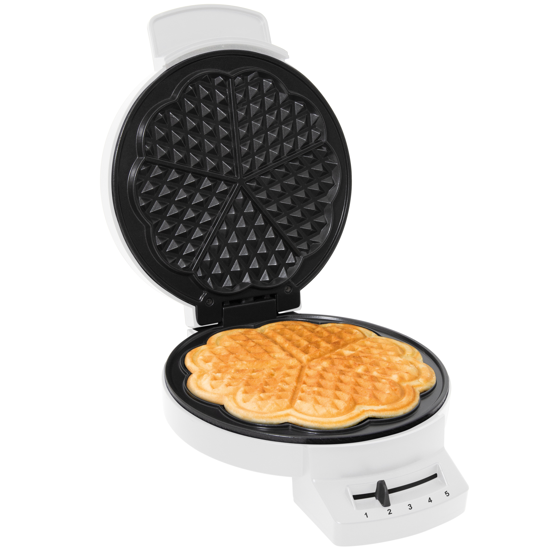 Een open witte wafelmaker met een gouden hartvormige wafel.