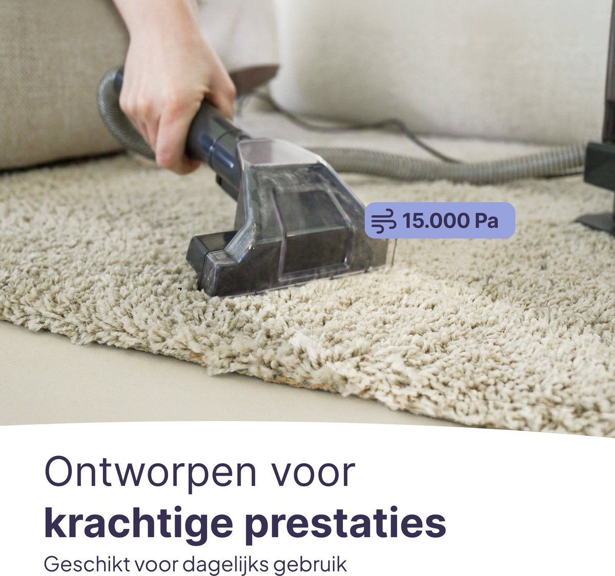 A handheld vacuum cleaner cleans a light carpet. 15,000 Pa suction power.