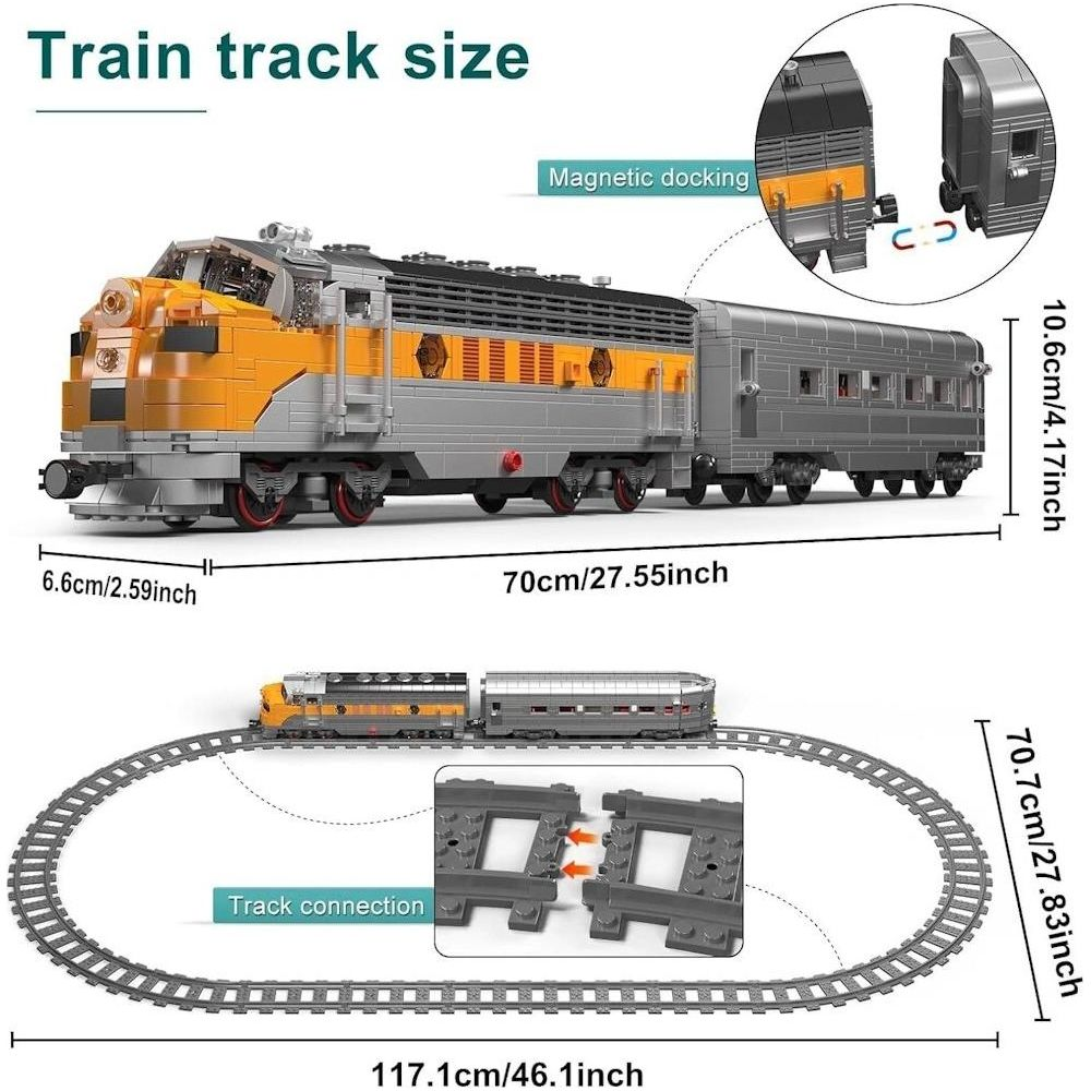 Un train modèle gris et jaune en blocs de construction avec rails et dimensions.